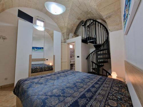 Un pat sau paturi într-o cameră la Casa dei puffi in Salento