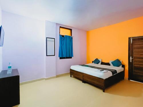 Säng eller sängar i ett rum på Hotel Near IGI Airport