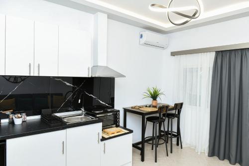 Η κουζίνα ή μικρή κουζίνα στο Sias Apartment