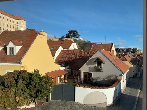 arial view of a residential neighborhood with houses at Hotel Desatero in Mikulov