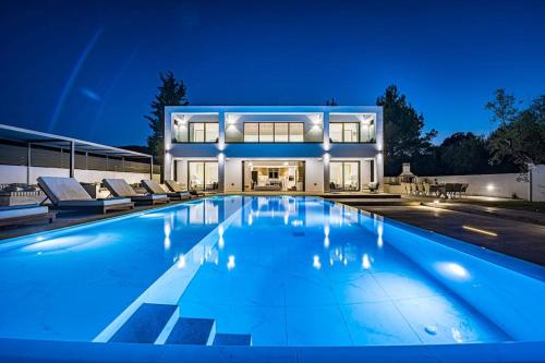 Bazén v ubytování LDV ZANTE VILLAS Divine Villa Zakynthos (Laganas) nebo v jeho okolí