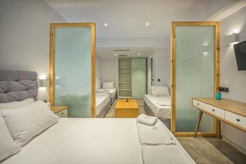 Postel nebo postele na pokoji v ubytování LDV ZANTE VILLAS Divine Villa Zakynthos (Laganas)
