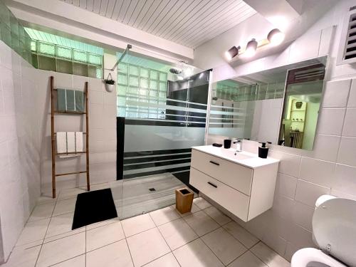 Koupelna v ubytování Appartement Le Colibri avec jacuzzi