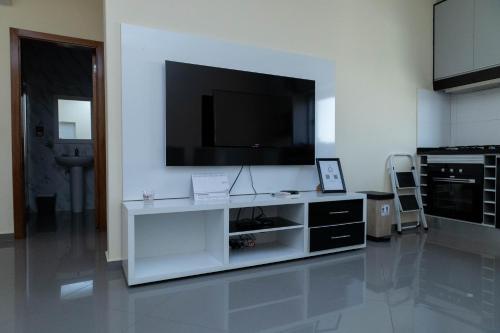 Телевизор и/или развлекательный центр в Cidadela Apartment