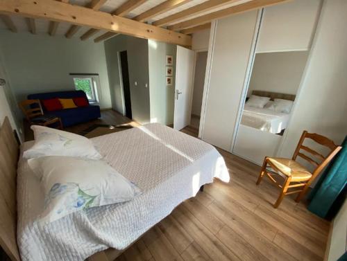Кровать или кровати в номере Maison neuve tout confort, deux chambres