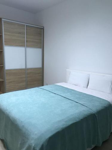 Llit o llits en una habitació de Luxury Apartment