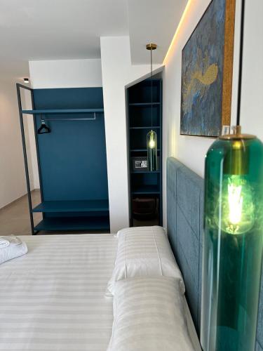 Ένα ή περισσότερα κρεβάτια σε δωμάτιο στο Amani Chic Rooms