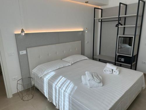 Ένα ή περισσότερα κρεβάτια σε δωμάτιο στο Amani Chic Rooms