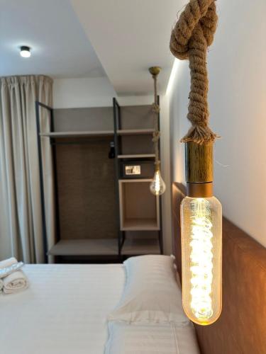 Ένα ή περισσότερα κρεβάτια σε δωμάτιο στο Amani Chic Rooms