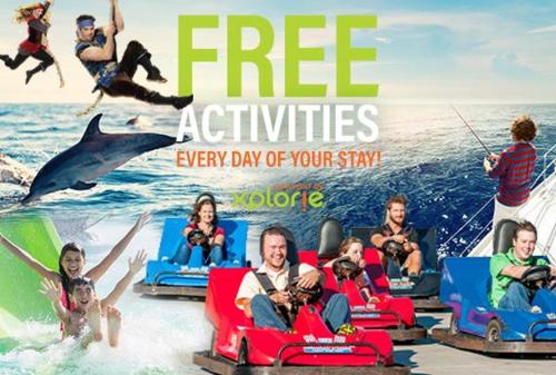 a group of people riding on a water ride at Blue Moon - 3rd Row - Ocean Drive Section in Myrtle Beach