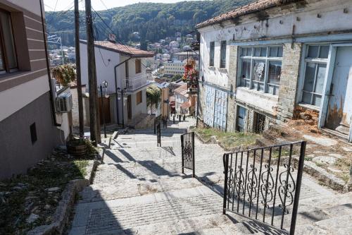 an alley in an old town with a gate at ON TOP Central Villa in Kruševo