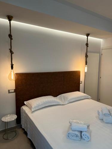 Ένα ή περισσότερα κρεβάτια σε δωμάτιο στο Amani Chic Rooms