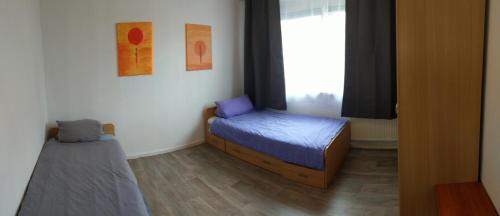 Postel nebo postele na pokoji v ubytování Ferienwohnung Zwickau