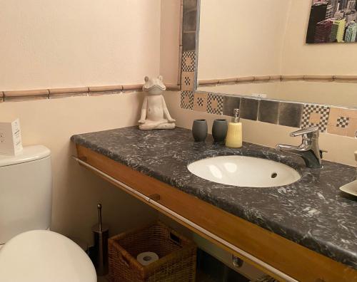 a bathroom with a sink and a toilet at Arachova5634 in Arachova