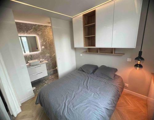 Postelja oz. postelje v sobi nastanitve Appartement Malesherbes Paris