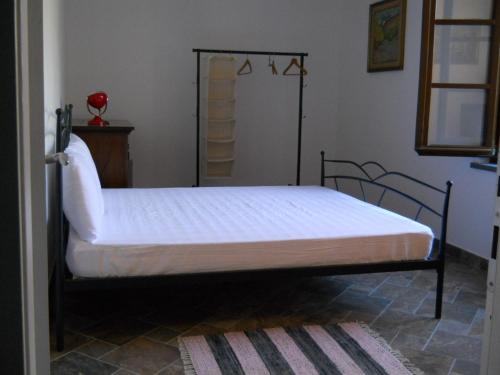 Voodi või voodid majutusasutuse Tra La Costa Apartments toas