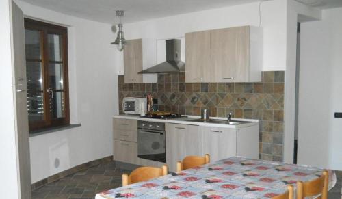 Dapur atau dapur kecil di Tra La Costa Apartments