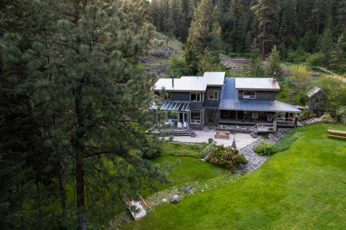 an aerial view of a house in the woods at Mountain Springs Nature Retreat in Kaleden