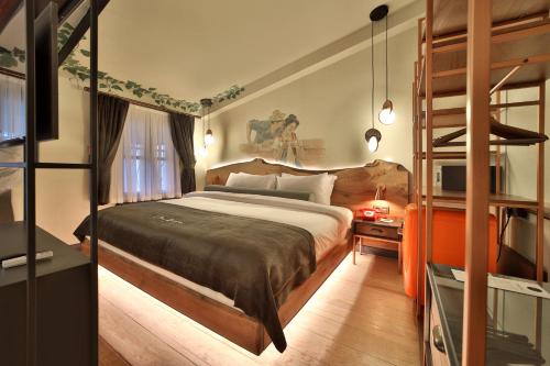 a bedroom with a bed and a bunk bed at Impera Hotel - Special Category in Istanbul