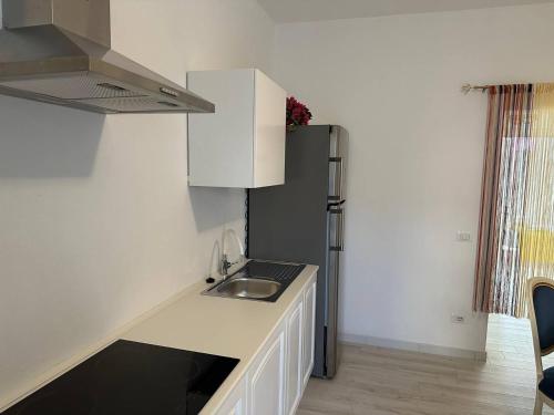 Η κουζίνα ή μικρή κουζίνα στο Blessed House Rooms