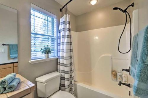a bathroom with a toilet and a shower at Weekly Discount - Cozy Elegant Flagstaff House in Flagstaff