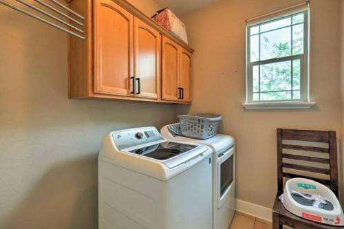 a laundry room with a washer and a window at Weekly Discount - Cozy Elegant Flagstaff House in Flagstaff