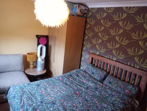 Ένα ή περισσότερα κρεβάτια σε δωμάτιο στο Levens Terrace, Barrow Spa Therapy