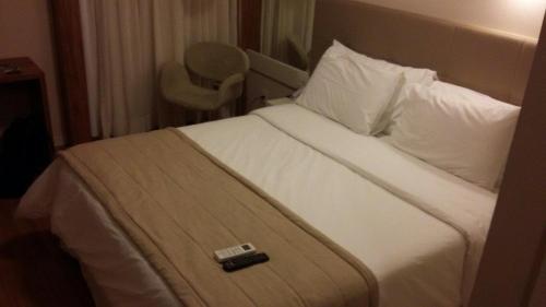 Cama o camas de una habitación en QUARTO DUPLO - Suíte