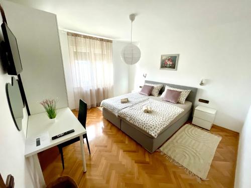 Ένα ή περισσότερα κρεβάτια σε δωμάτιο στο Apartman Bago Deluxe near Zagreb Airport