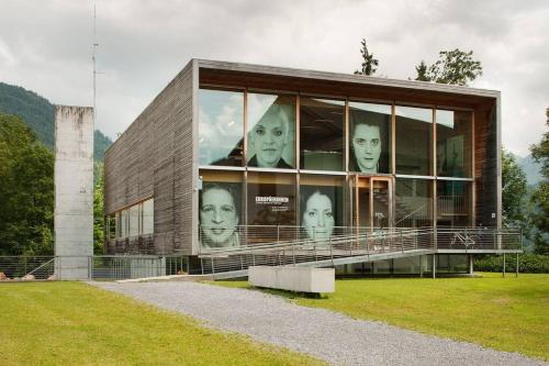 a building with faces on the side of it at Relax Apartment in Krumbach