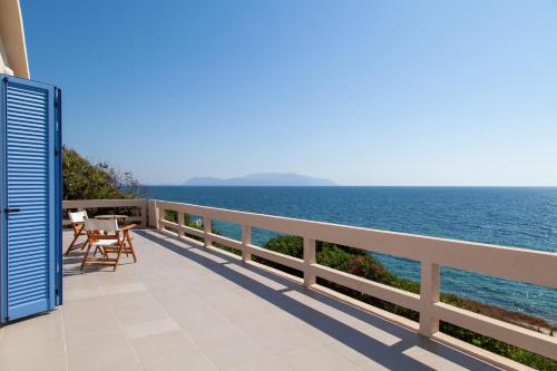 a balcony with a view of the ocean at Villa Moby Dick in Mitikas