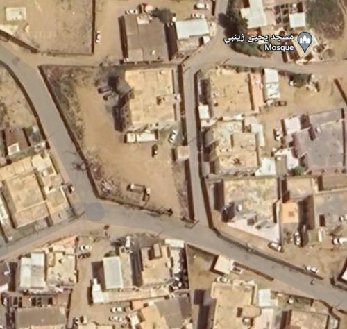 an aerial view of a city with buildings and roads at شقة الخير in Salhabah