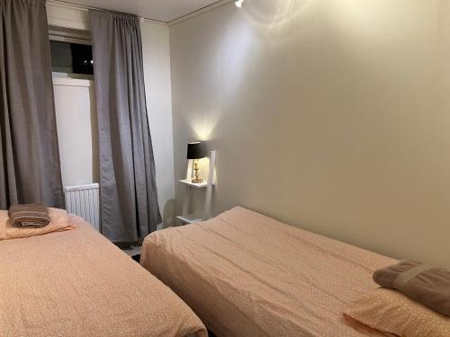 Säng eller sängar i ett rum på Eget hus i Linköping västra