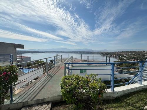 a dock with a view of a body of water at Terraza del Lago in Tequesquitengo
