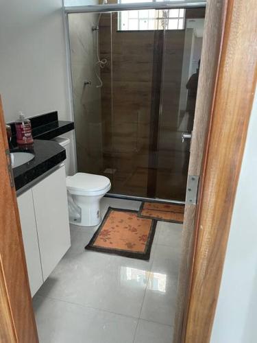 Ванная комната в Espaço aconchegante