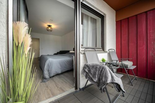 Ένα ή περισσότερα κρεβάτια σε δωμάτιο στο Direkter Thermenzugang & Golfresort