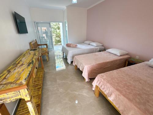 Katil atau katil-katil dalam bilik di São Francisco Flats