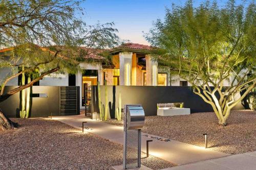 a house with a sign in front of it at The Concept, A Vacation Retreat in Moon Valley in Phoenix