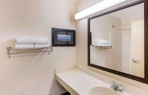 a bathroom with a sink and a mirror at Extended Stay America Suites - Los Angeles - Ontario Airport in Guasti