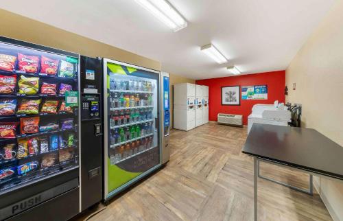 a store with a soda machine in a room at Extended Stay America Suites - Los Angeles - Ontario Airport in Guasti