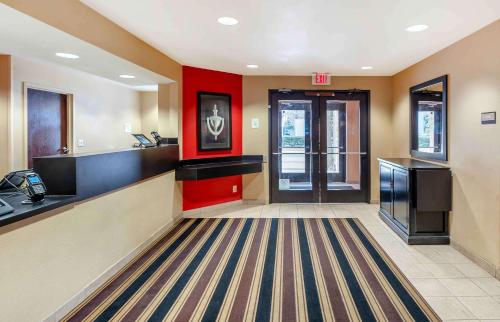 a lobby of a hotel room with a lobby at Extended Stay America Suites - Hampton - Coliseum in Hampton