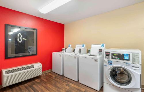 a laundry room with a washer and dryer at Extended Stay America Suites - Hampton - Coliseum in Hampton