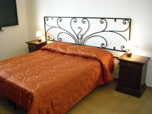 Postel nebo postele na pokoji v ubytování Agriturismo San Matteo