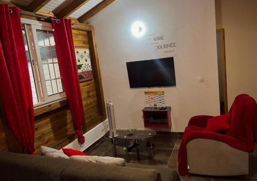 Un televizor și/sau centru de divertisment la Villa Cachiman