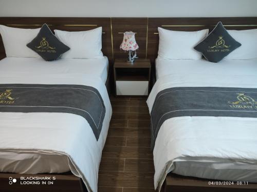 Una cama o camas en una habitación de LS HOTEl