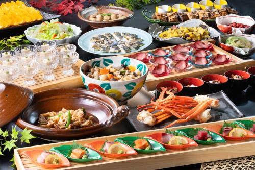 a buffet of different types of food on a table at Motosu Phoenix Hotel in Fujikawaguchiko