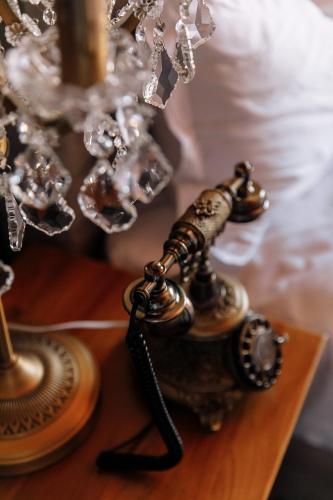 an old fashioned telephone sitting on a table at The Bellwood Manor in Nuwara Eliya