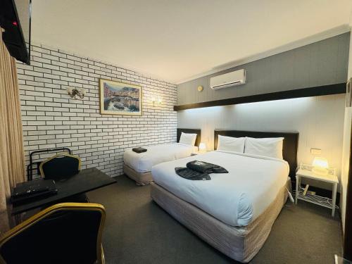 מיטה או מיטות בחדר ב-Motel St Arnaud