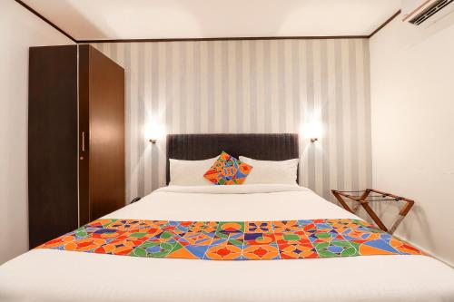 Ένα ή περισσότερα κρεβάτια σε δωμάτιο στο FabHotel Park Inn - Indiranagar