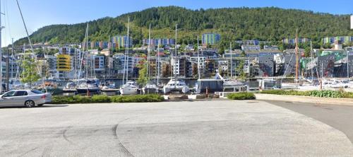 a parking lot with a bunch of boats in a harbor at Yacht & Breakfast in Bergen